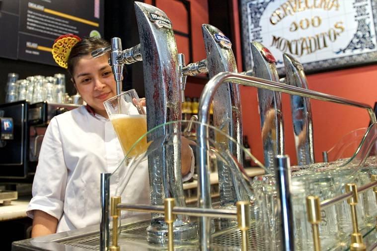 Beer taps behind a bar
